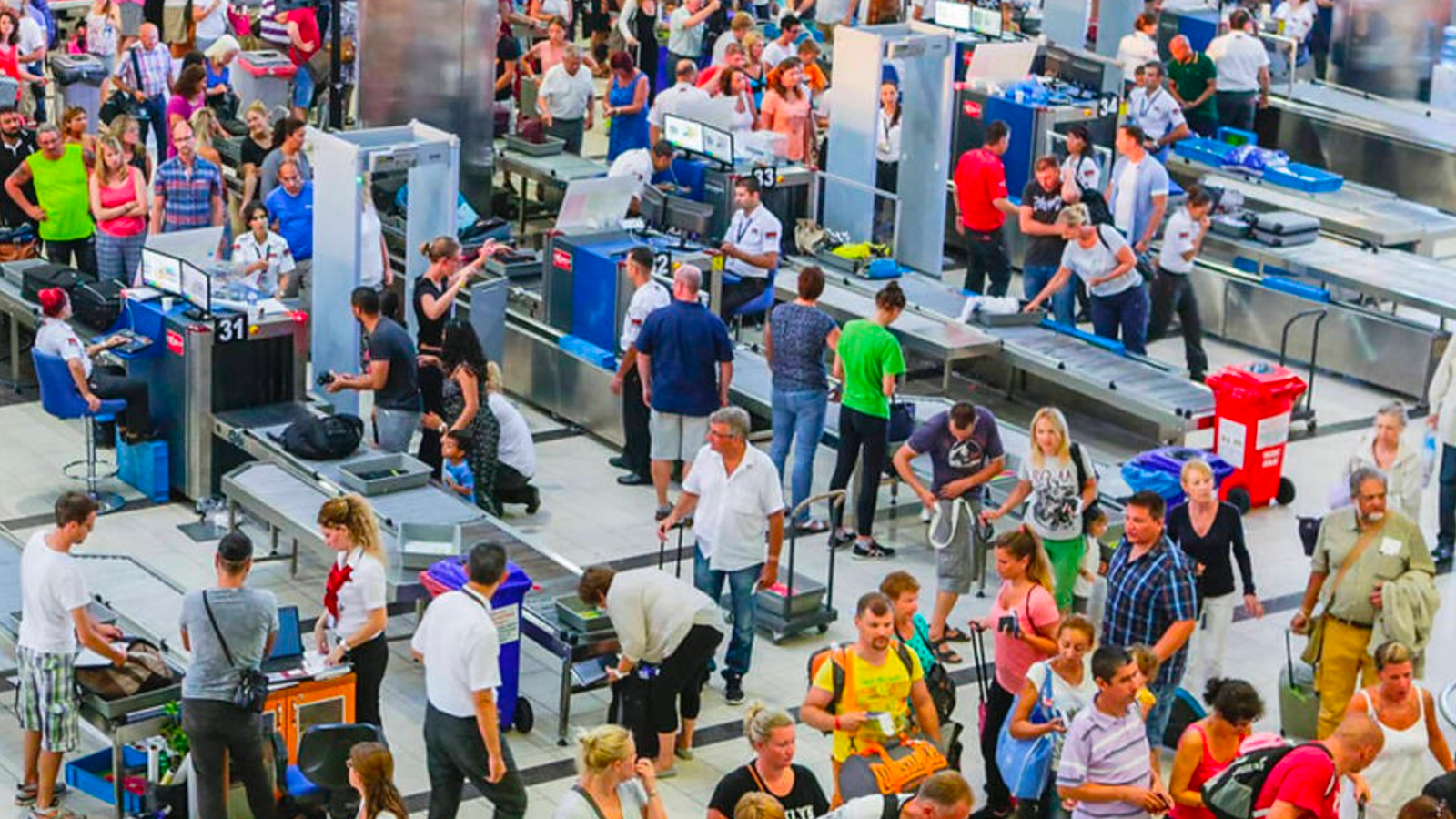 Long airport security wait times cause passenger dissatisfaction at busy airports