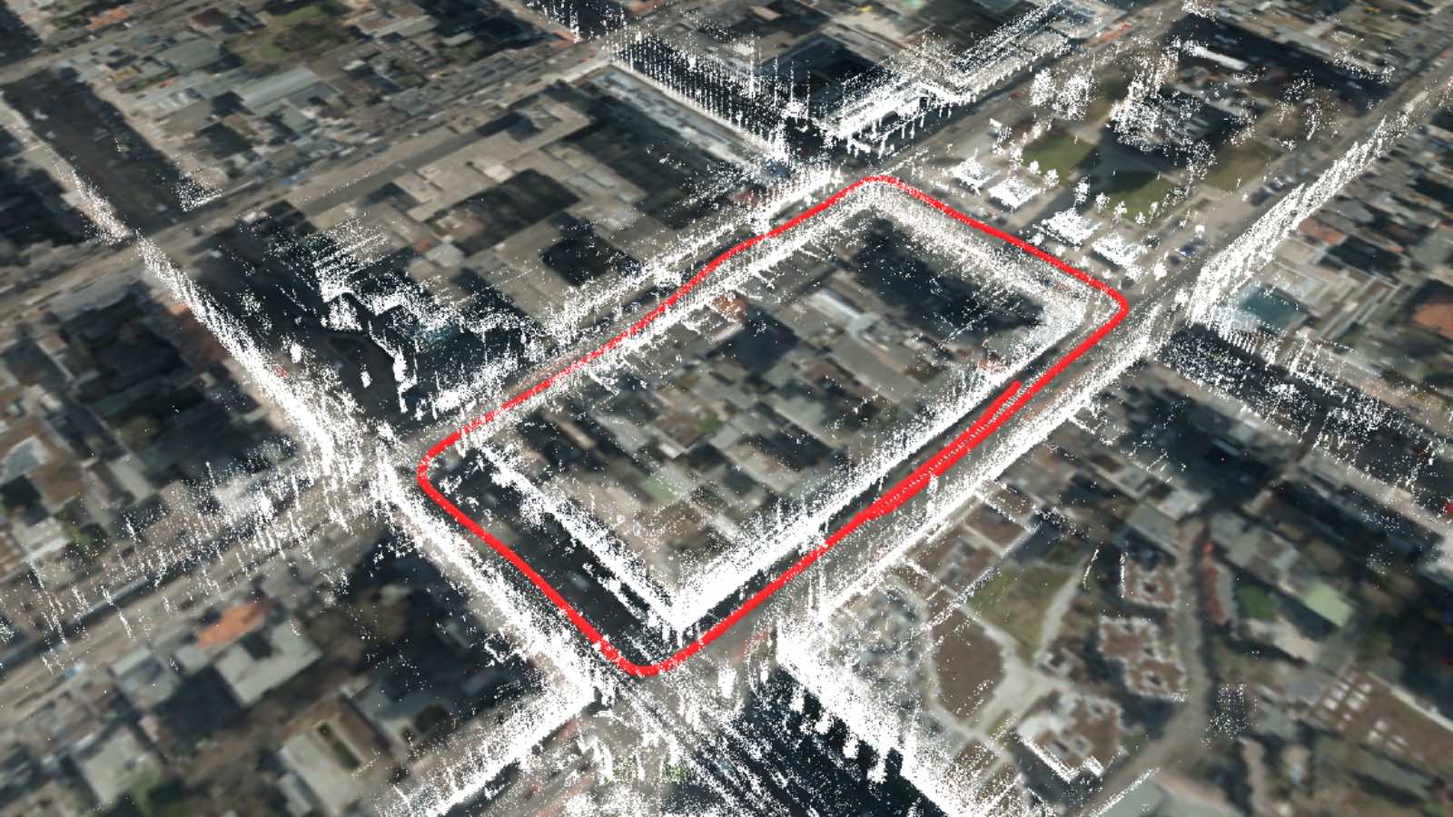 LiDAR map cut-out of a city with a red line drawn on the ground, accompanied by a GNSS track for orientation